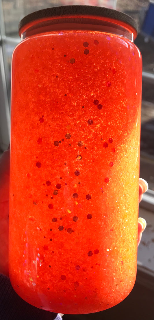 A Pre Made Glass 16 oz Fluorescent Orange Glow in the Dark